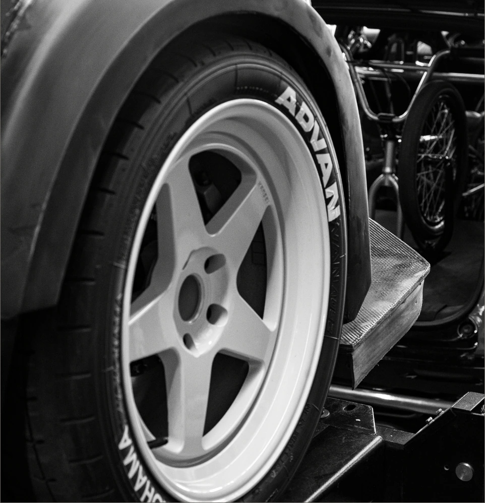 Close study of a wheel and surrounding bodywork at Garage 619